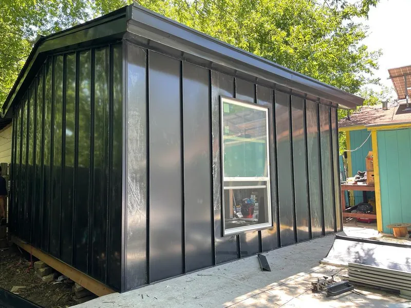 Black standing seam metal wall panels for Metal Roof Installation in Coppell